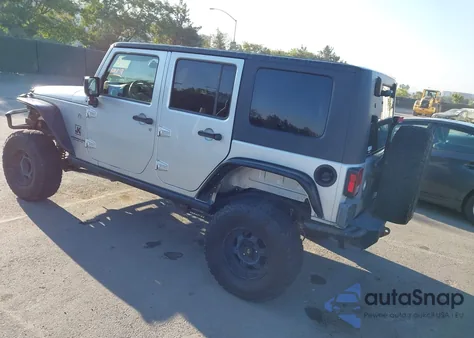 2009 Jeep Wrangler Unlimited Sahara z USA, uszkodzony, nr VIN 1J4GA59129L711452